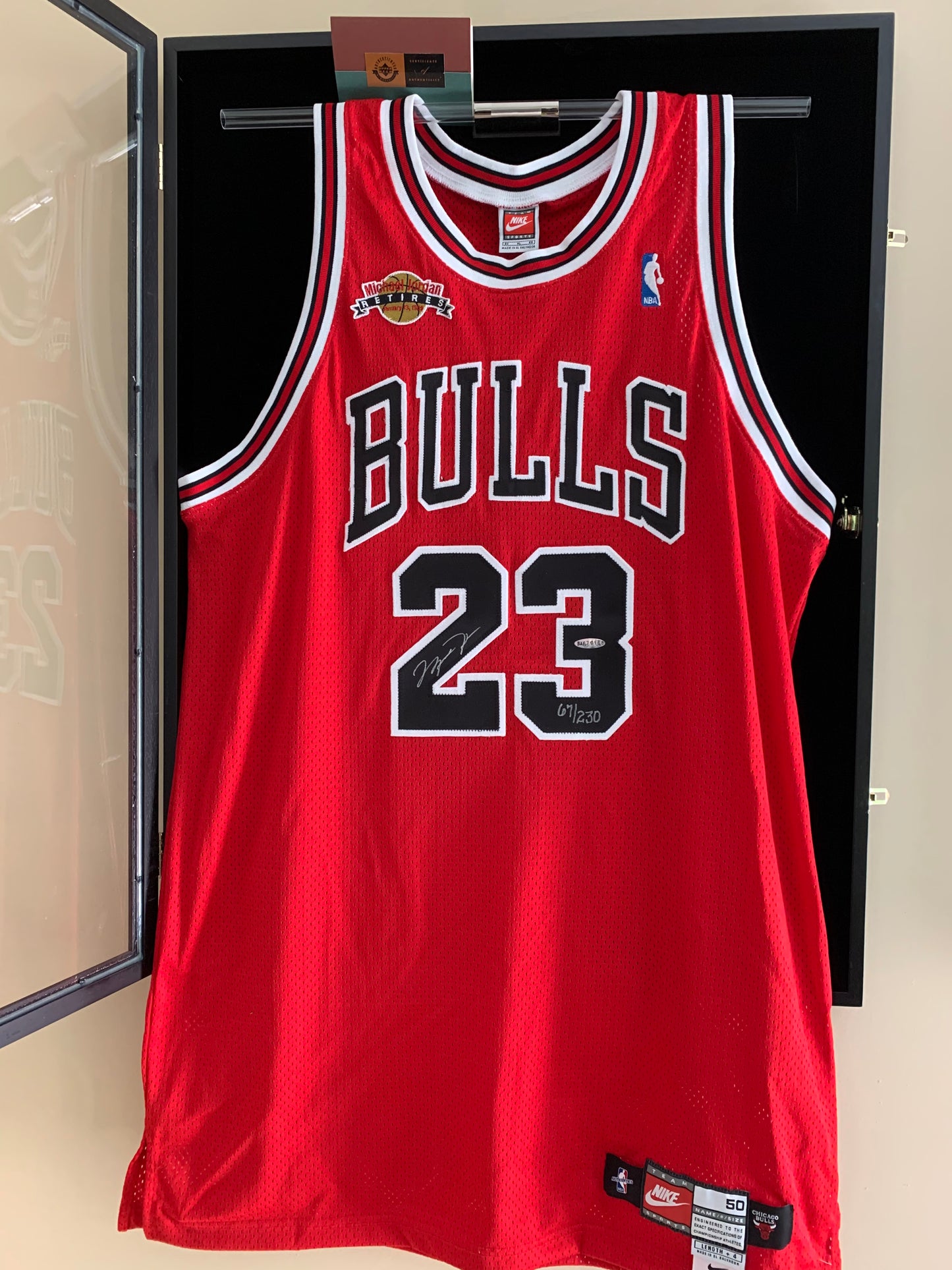 Michael Jordan Autographed Retirement Patch Jersey #67/230 Upper Deck Authenticated